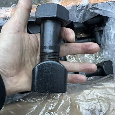 Screws, chains, drive teeth, and screws for the tracks of excavators and bulldozers